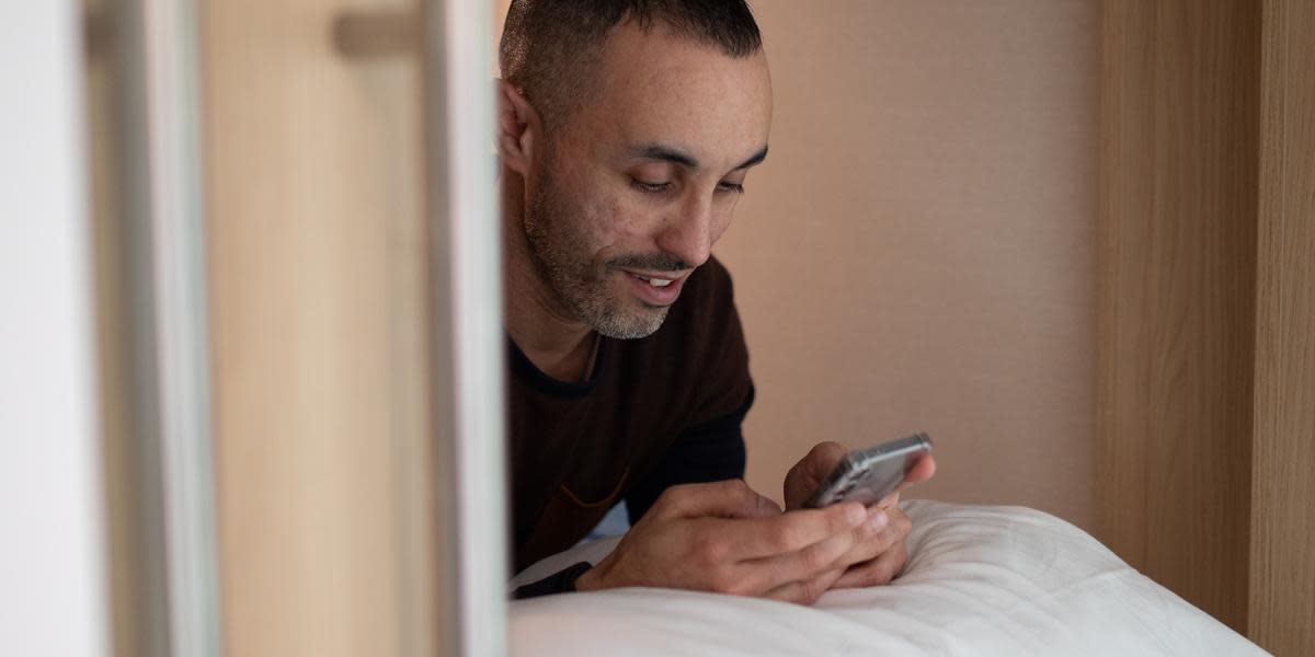 Men in the sleeping pod in Capsule Hotel