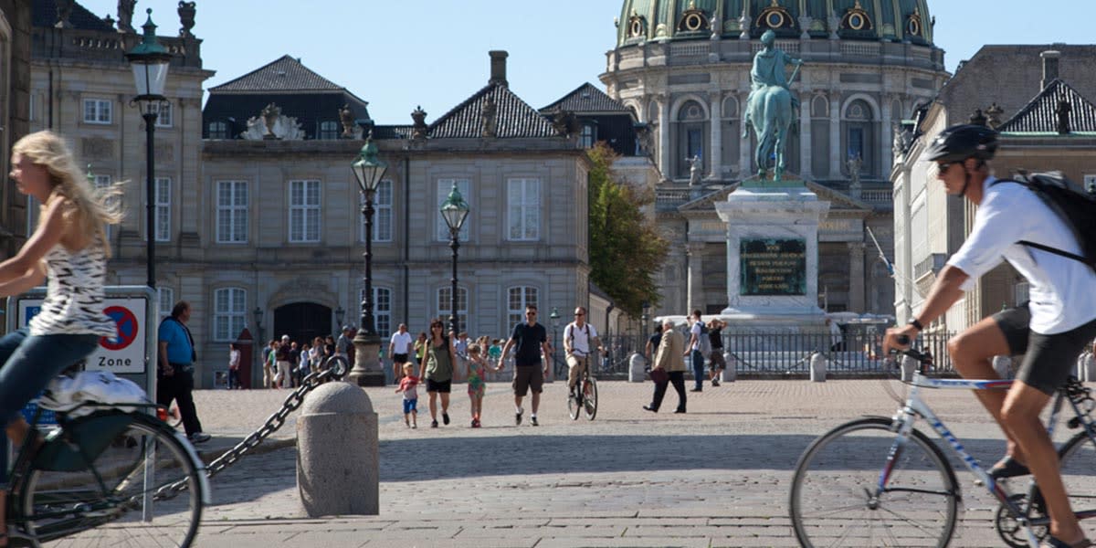 Amalienborg Castle in Copenhagen - people cycling 