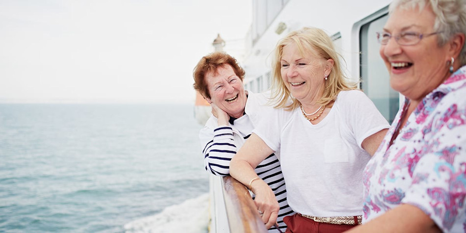 Three women on deck, onboard the DFDS Newhaven- Dieppe ferry.