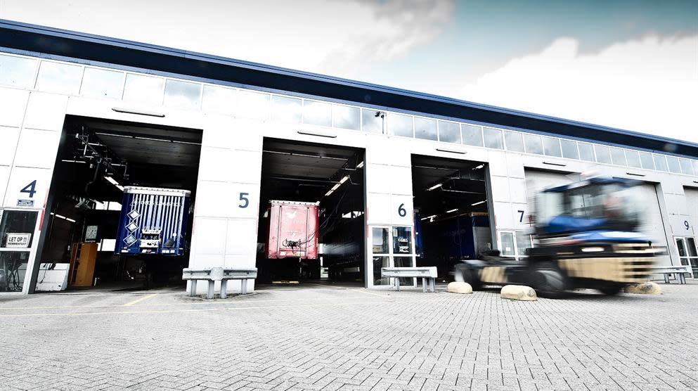 Truck departing the DFDS Vlaardingen terminal workshop VLA Workhop
