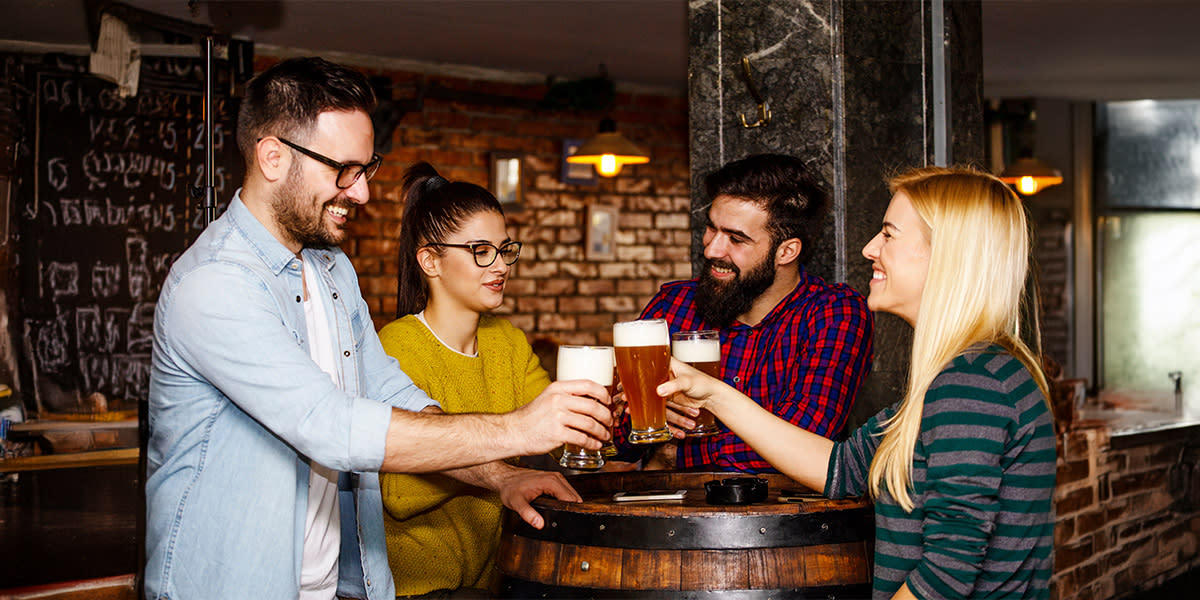 Friends cheers with beer