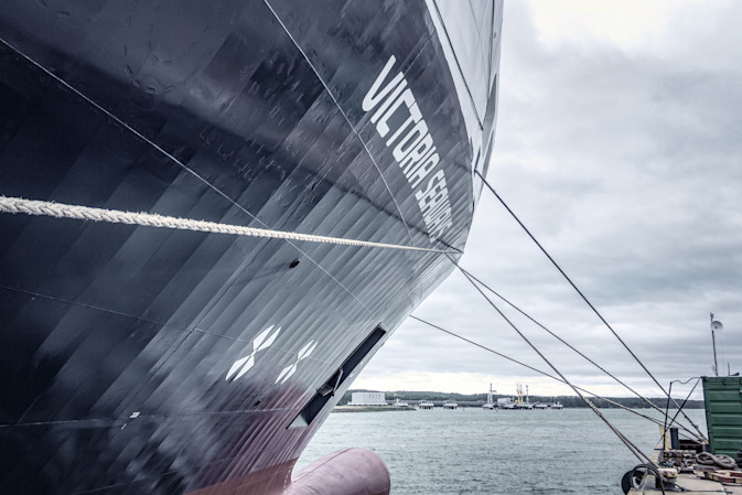 Side view of the stern of the DFDS Freight Shipping vessel Victoria Seaways at dock