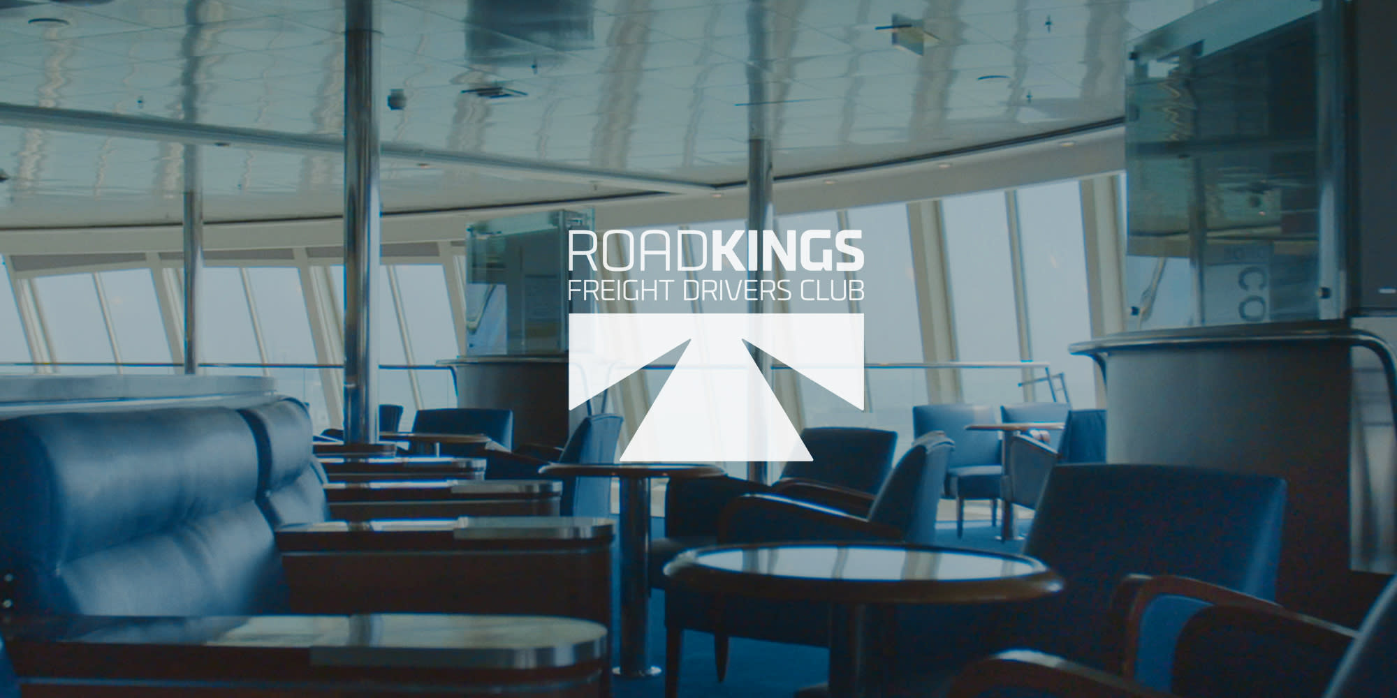 Logo of the Road Kings freight drivers club over a background showing a DFDS ship lounge area Road Kings on board