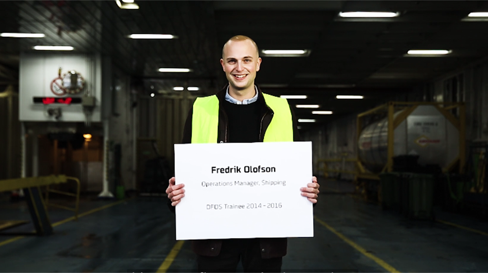 DFDS trainee Frederik Olufson standing on the car deck of a DFDS ship DFDS trainee programme