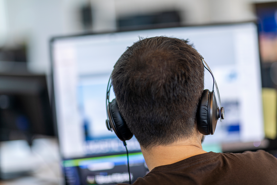 DFDS UX designer with headphones on dfds 0631 smaller