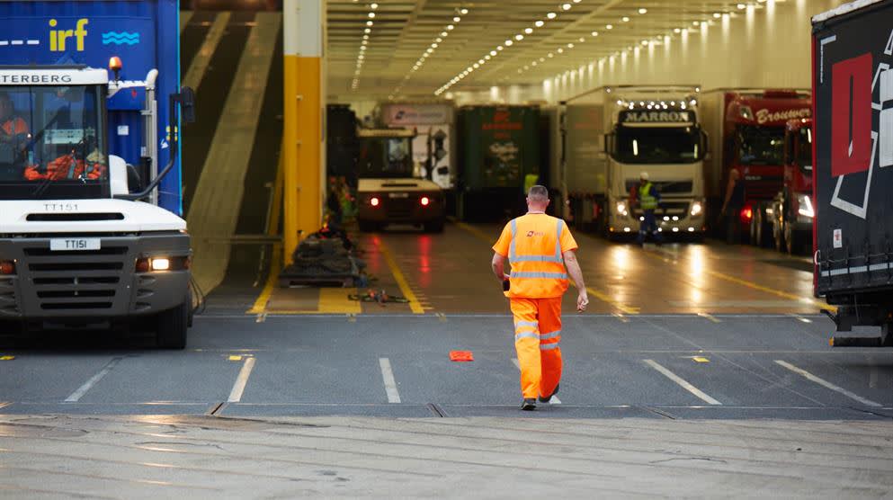 DFDS employee unloading trucks from a ship DFDS Q4 2017