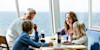 Family of four having a meal at 7 Seas restaurant onboard Eastern Channel Ferry.