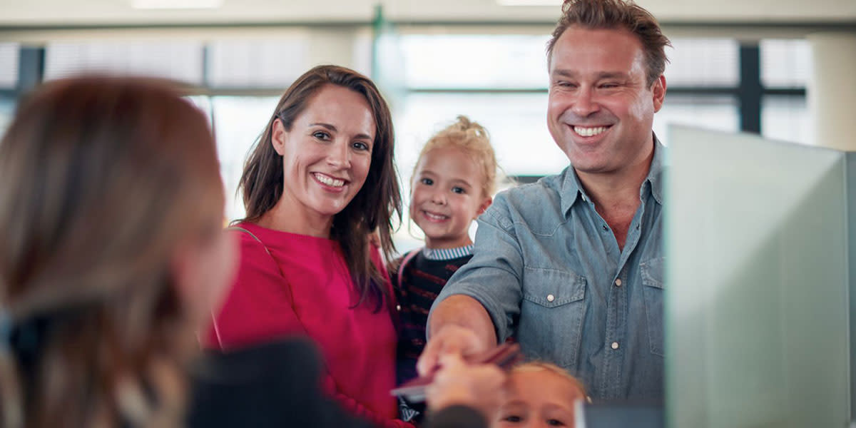 Family at check in Newcastle to Amsterdam