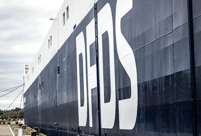 Large letters of DFDS on the side of a ship