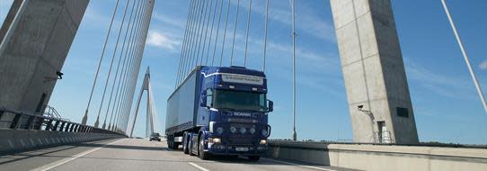 A DFDS Logistics truck crossing a bridge
