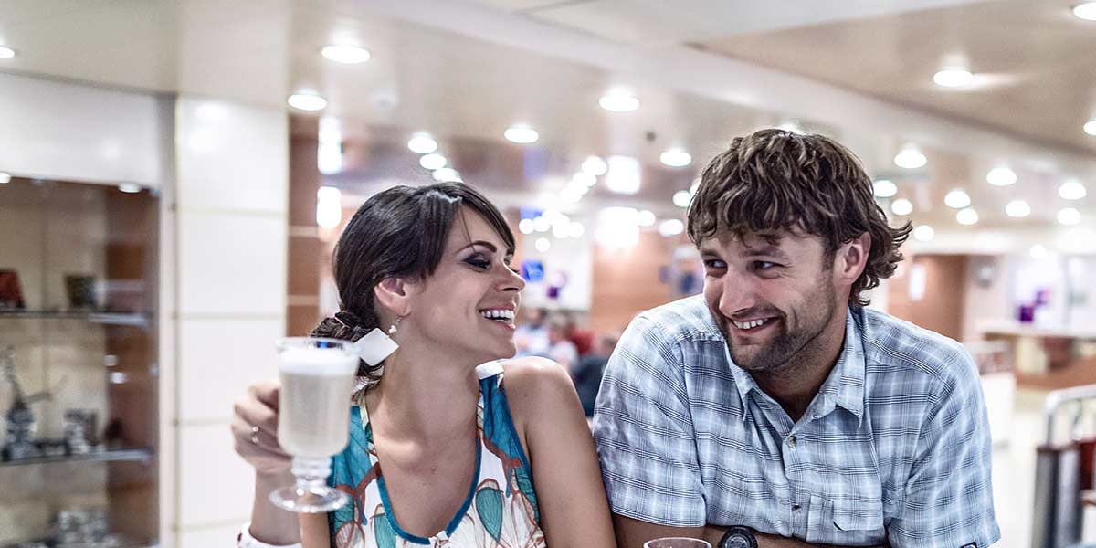 Couple enjoying the bar onboard Klaipeda-Karlshamn