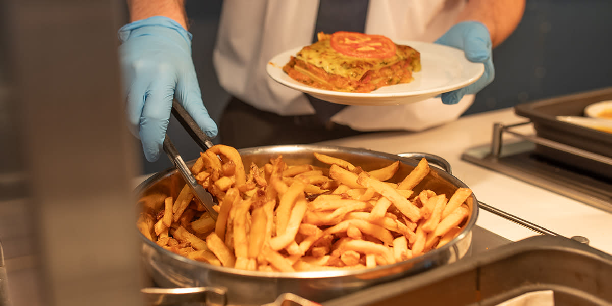 Fries and Lasagne in Maupassant Restaurant DINE