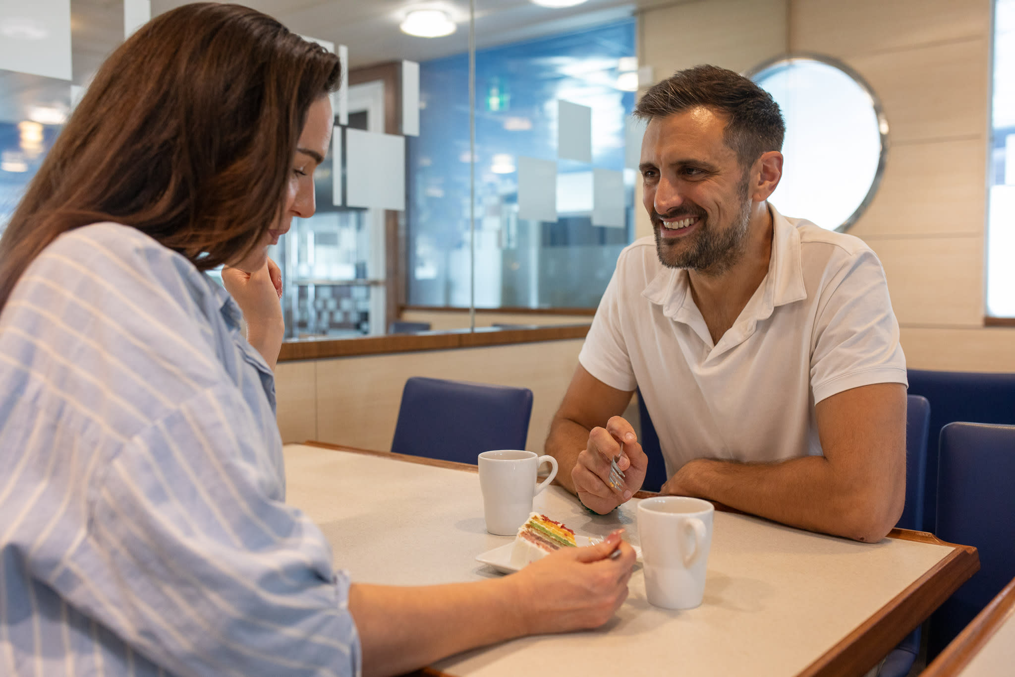 Stena Cafeteria couple sharing a rainbow cake