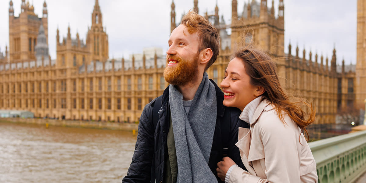 Couple with Palace of Westminster behind them