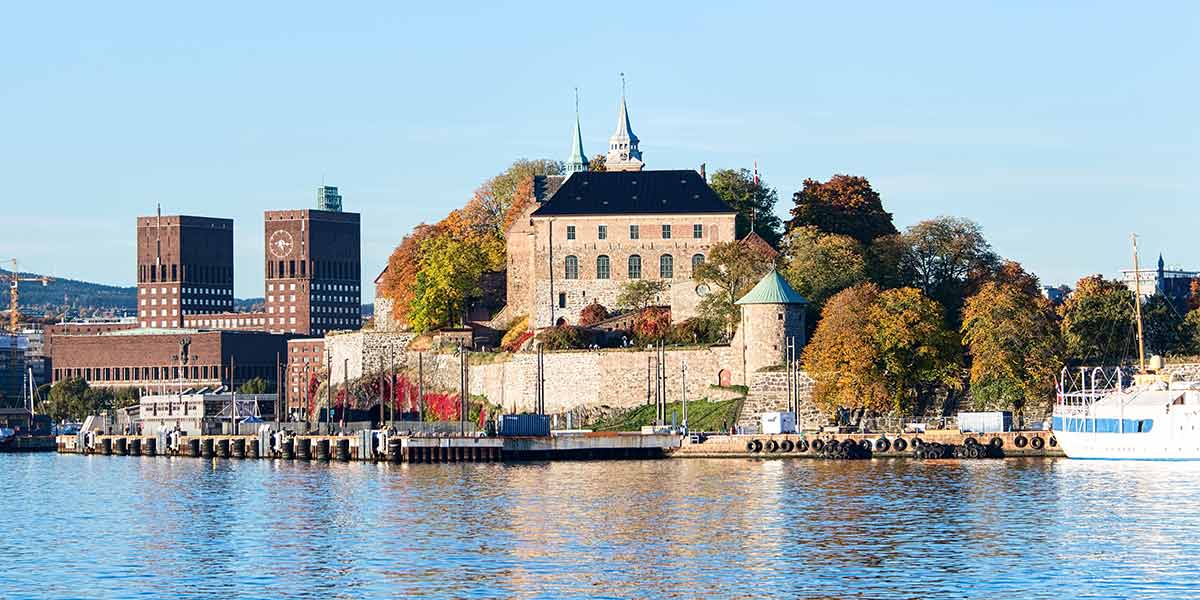Norway, Oslo with town hall building and Akershus fortress - promo