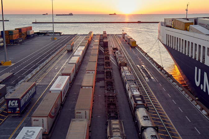 Trailers lined up beside a vessel at the DFDS Freight shipping terminal in Trieste