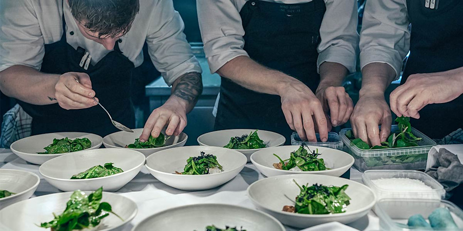 Chefs in preparing food in Sjo restaurant on DFDS ferry to Norway
