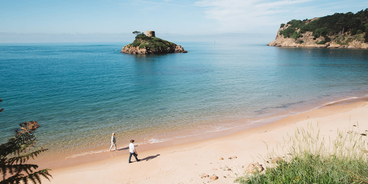 Jersey sandy beach with crystal clear sea Jersey sandy beach with crystal clear sea