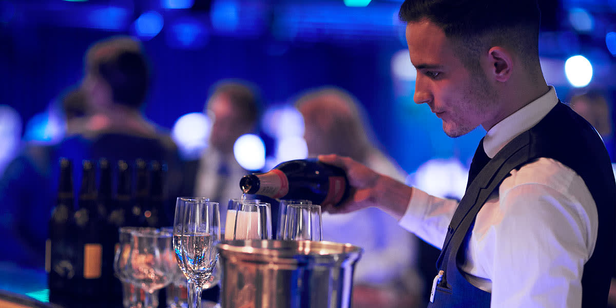Columbus nightclub bartender pouring drink