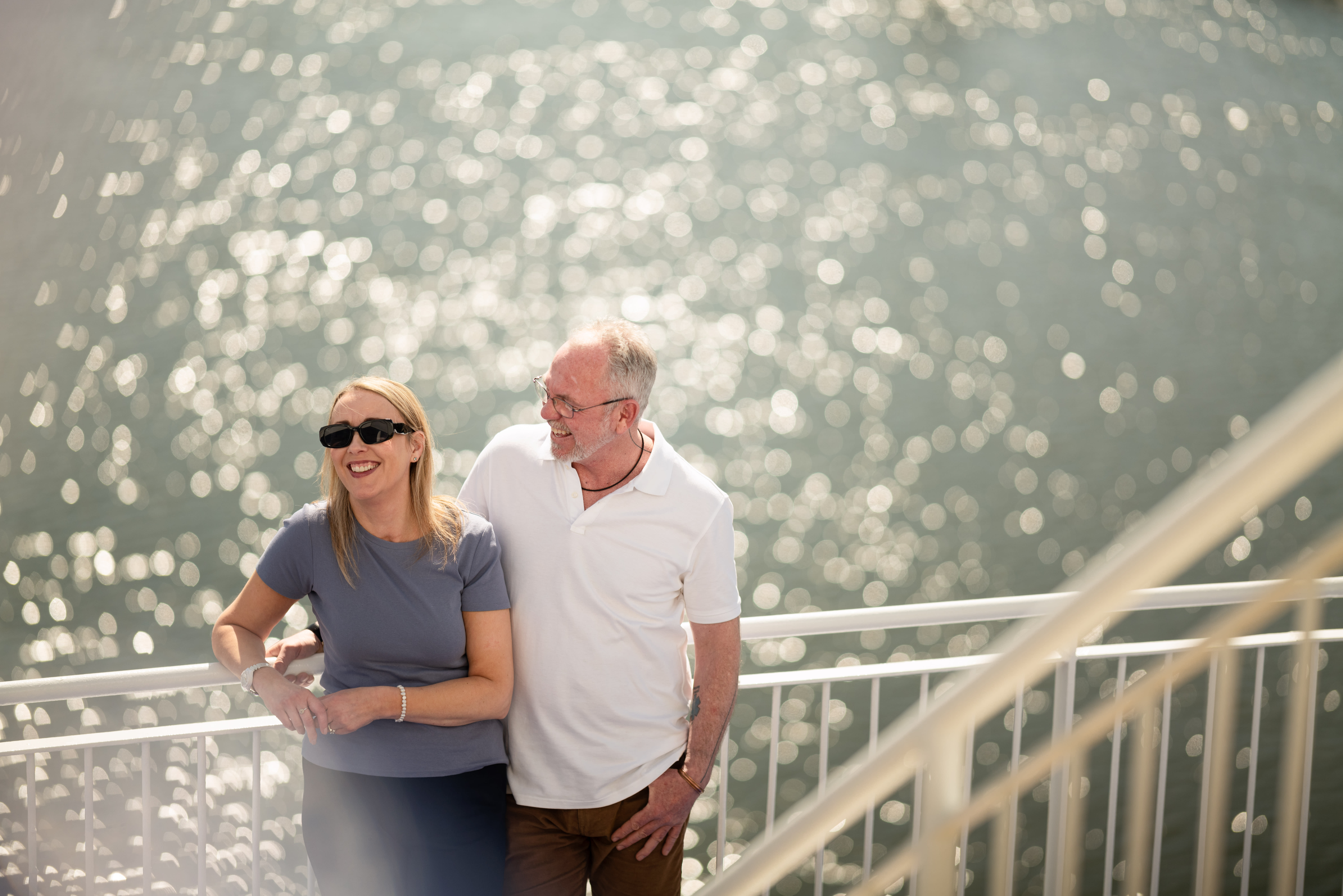 a couple on the deck of a DFDS ferry at sea  Couple on deck