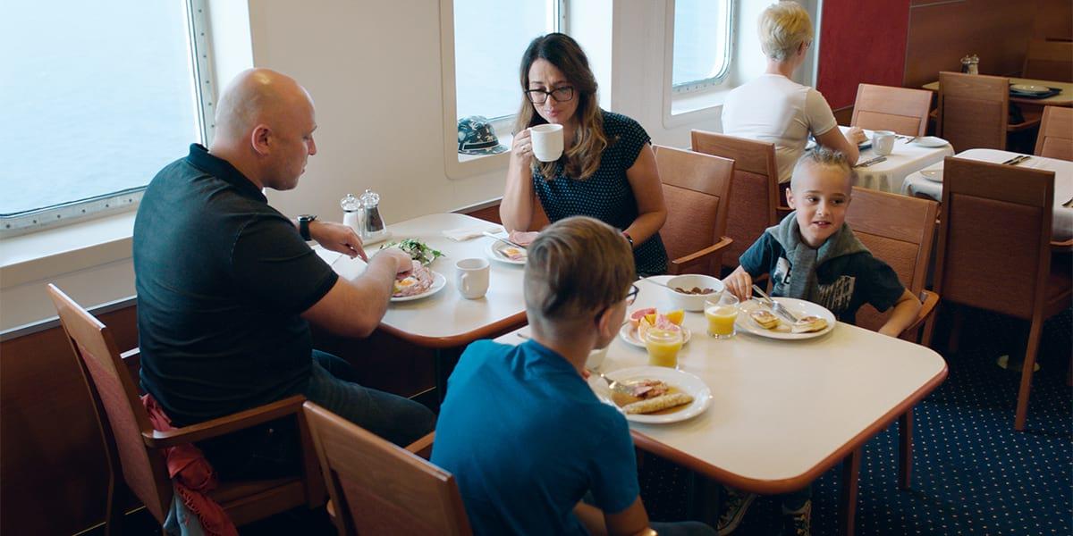 Family in self-service restaurant, Klaipeda-Kiel