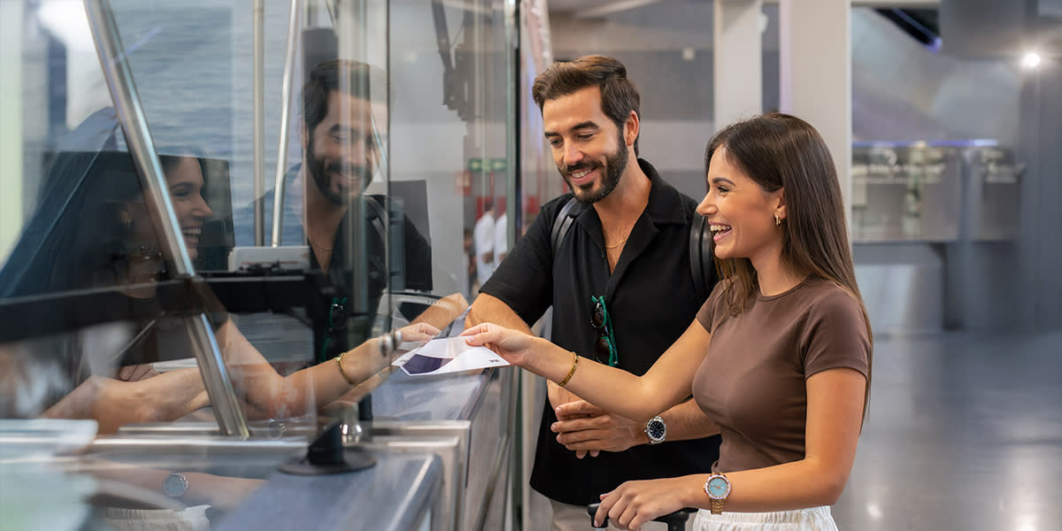 Couple at the ticket office of Algeciras SOG port Couple at ticket office port SOG