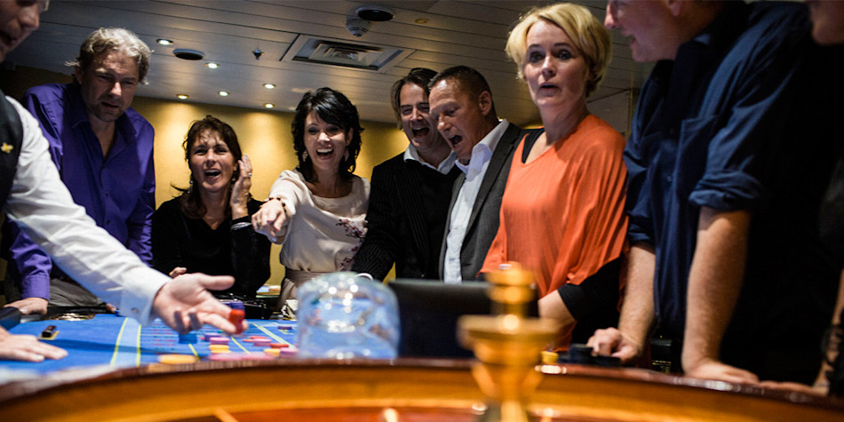 Friends enjoying themselves at the onboard Casino