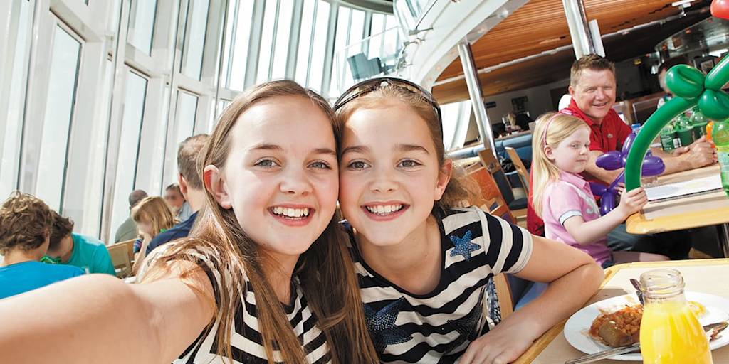 Two girls taking a selfie onboard DFDS ferry Family onboard DFDS ferry