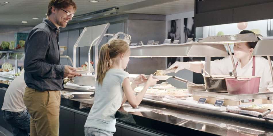 Young girl getting served in Explorers Kitchen onboard Newcastle-Amsterdam ferry