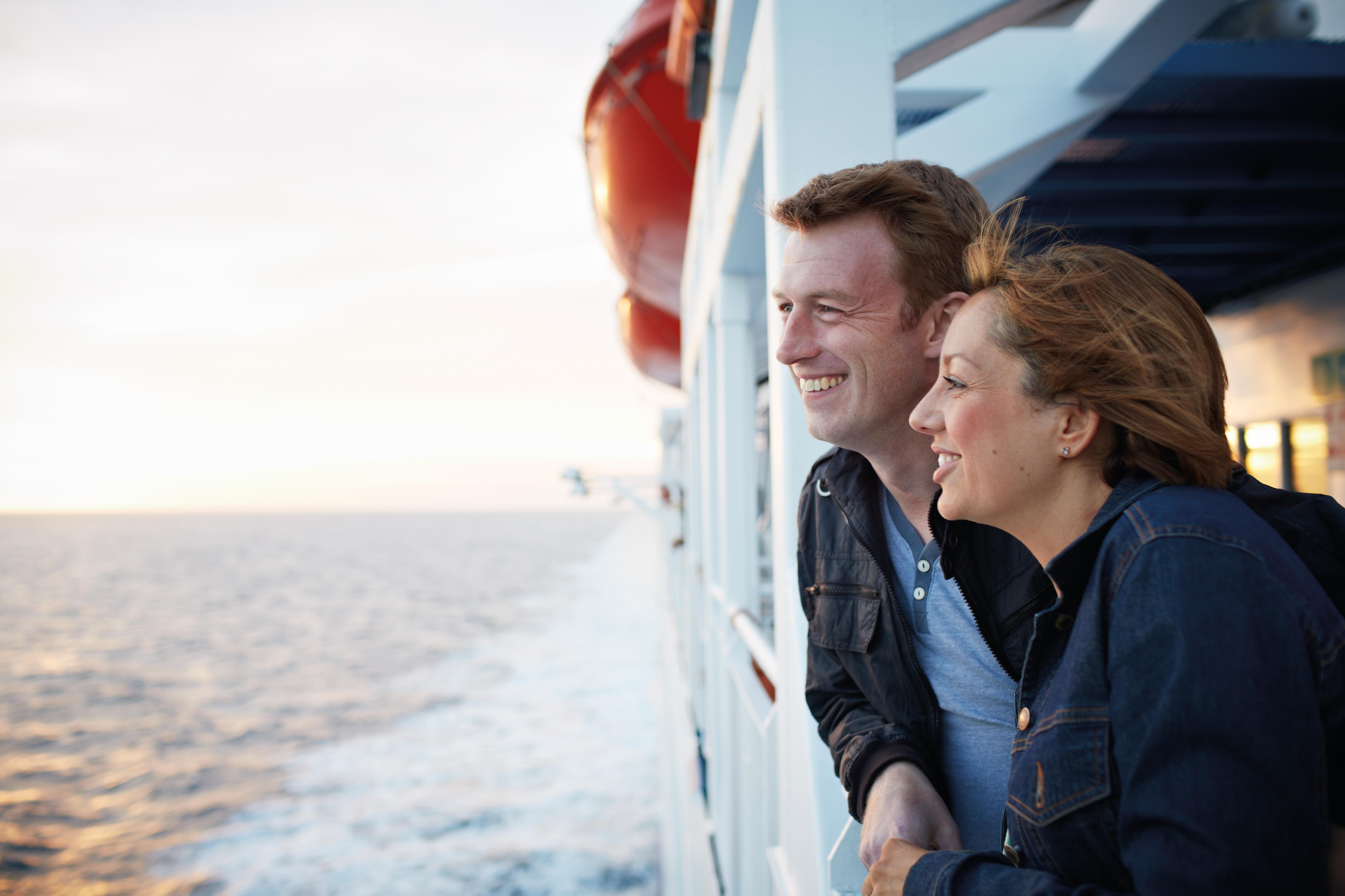 Couple on board - side of ferry HERO