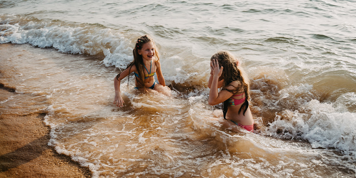 Kids are playing on beach in Palanga