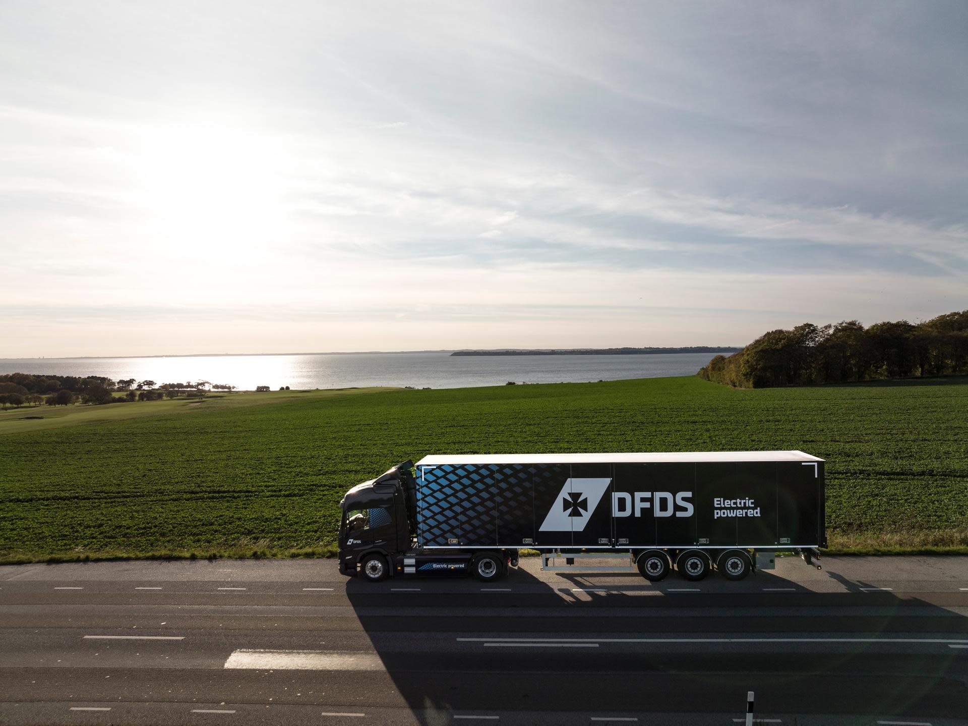 DJI 0039 - electric truck in dark blue DFDS livery - downloadable asset Media page About section