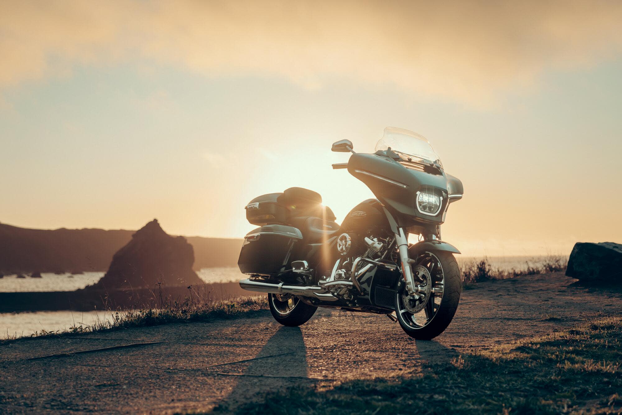 Harley Davidson motorbike at sunset Harley Davidson motorbike at sunset