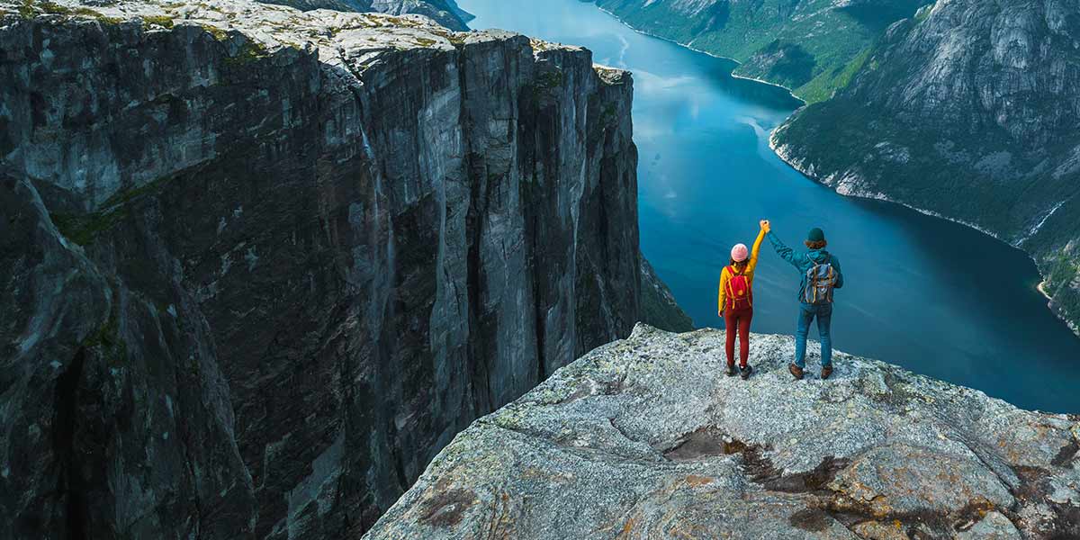 Standing at cliff in Norwayu Hero