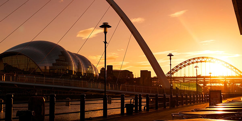 Sun setting on the bridges in Newcastle Quayside