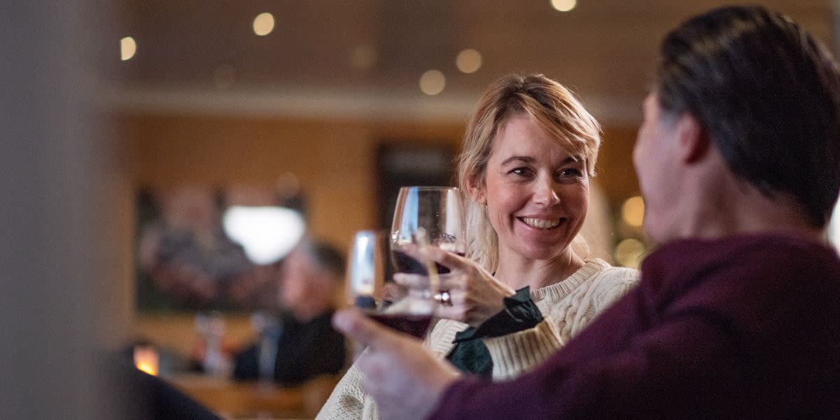 Couple having wine during christmas Couple having wine during christmas