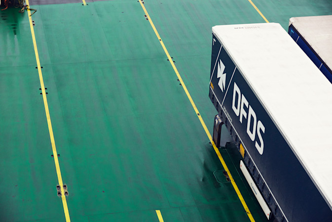 A DFDS trailer is parked 