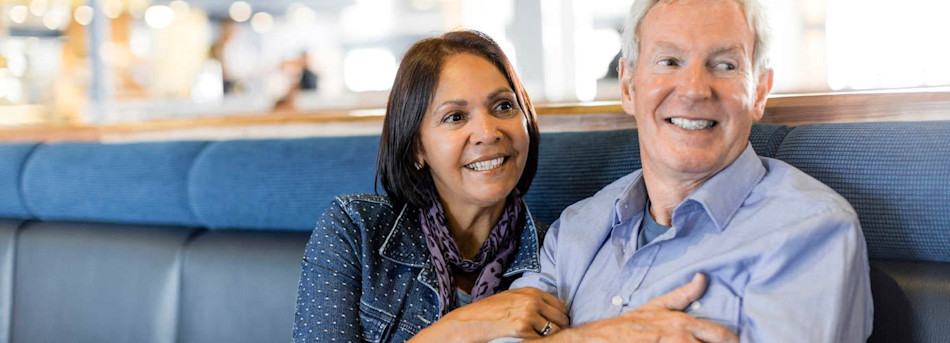 Couple sitting in quiet area onboard France-Dover