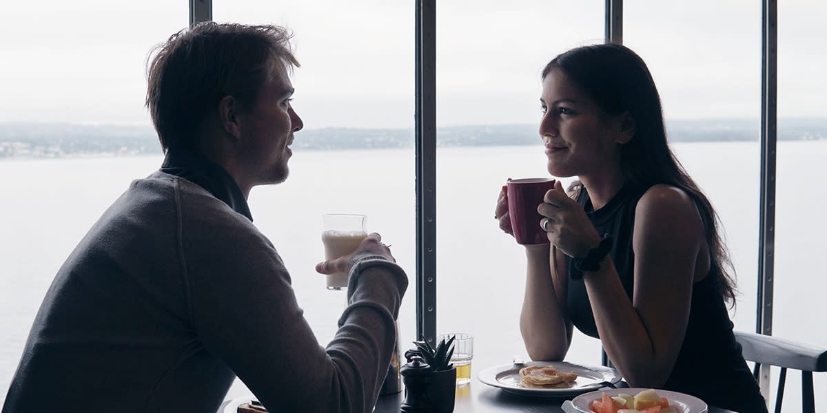 Couple dining onboard 