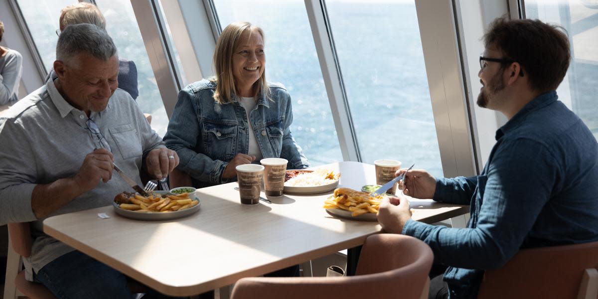 Family enjoying a meal Delft Seaways promo