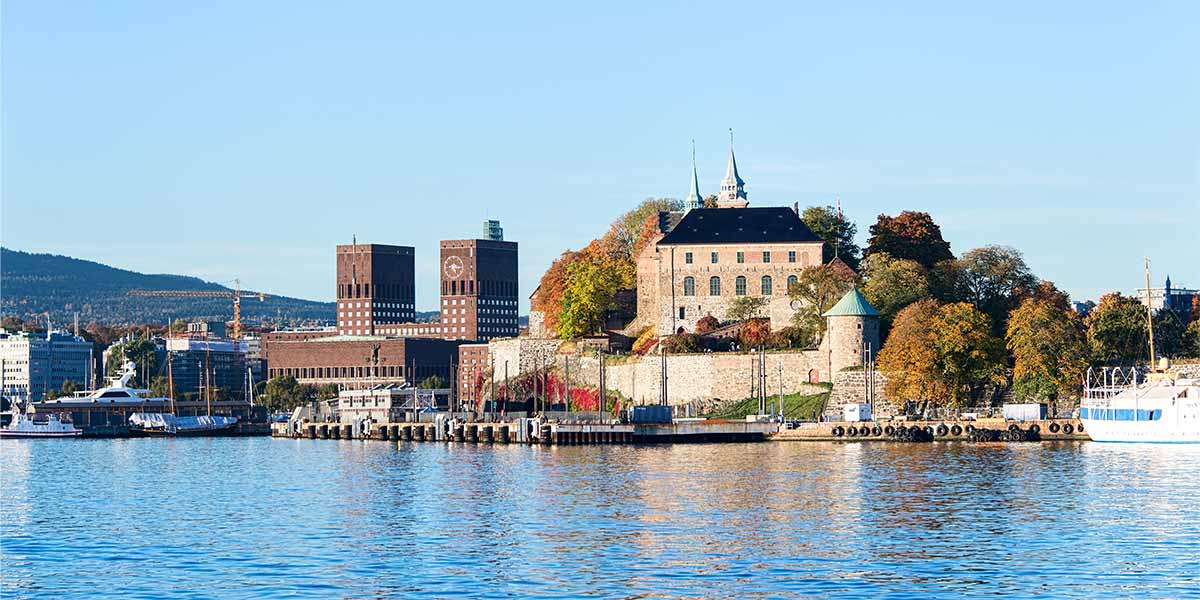 Norway, Oslo with town hall building and Akershus fortress Hero