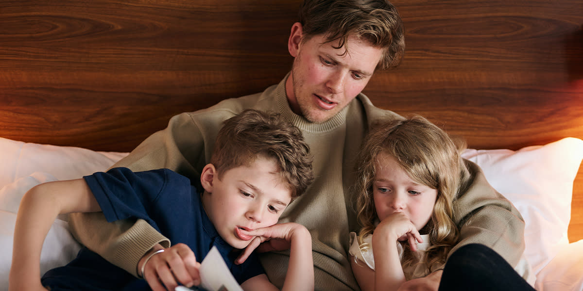 Father with kids in a cabin