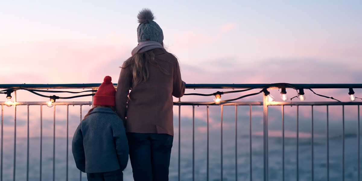 Mother and daughter at sunset on board PROMO