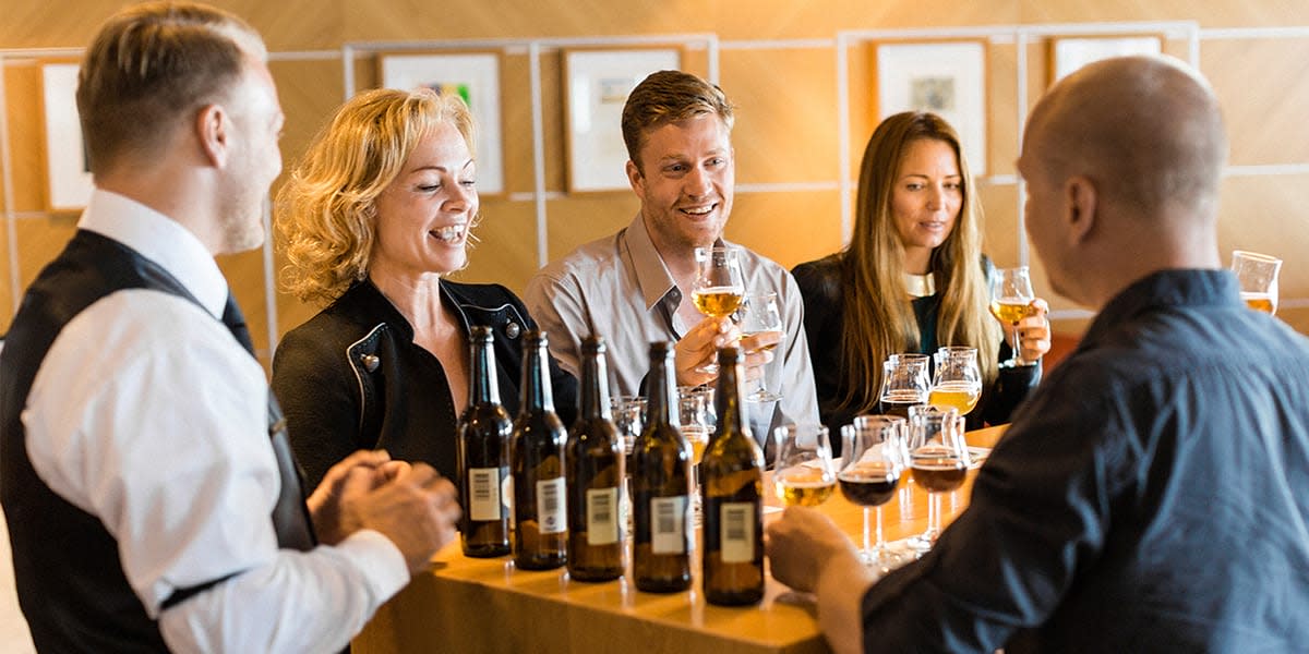 Guests in wine bar onboard Copenhagen-Oslo