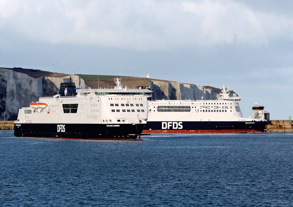 Two DFDS vessels with Cliffs of Dover in the background Ship