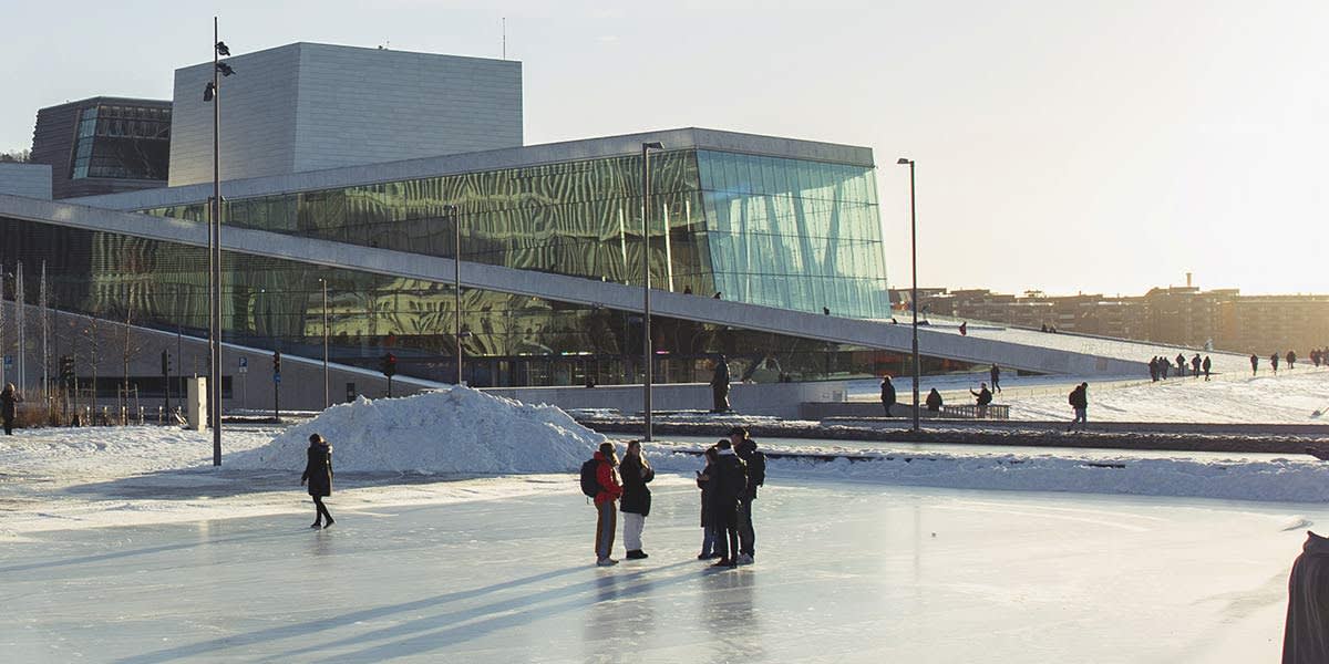 Standing on ice with view of building