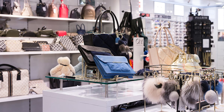 Fashionable items such as handbags and sunglasses on sale in one of the onboard shops.