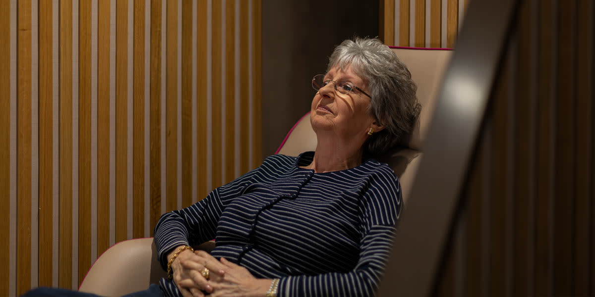 Woman enjoying our relax lounge onboard