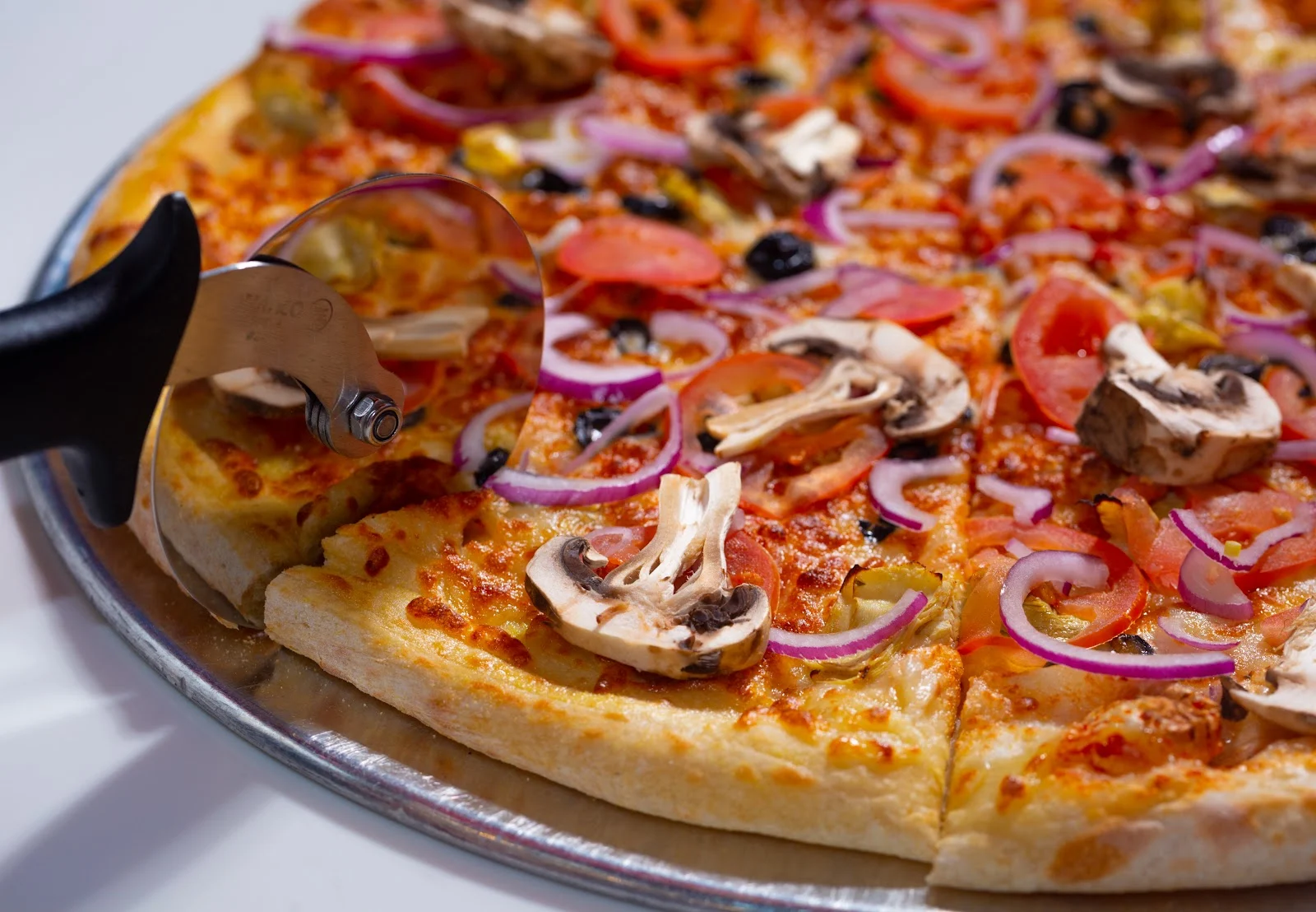 Google owner photo. Attribution: Pudge's Pizza (https://maps.google.com/maps/contrib/118394049007008965263)