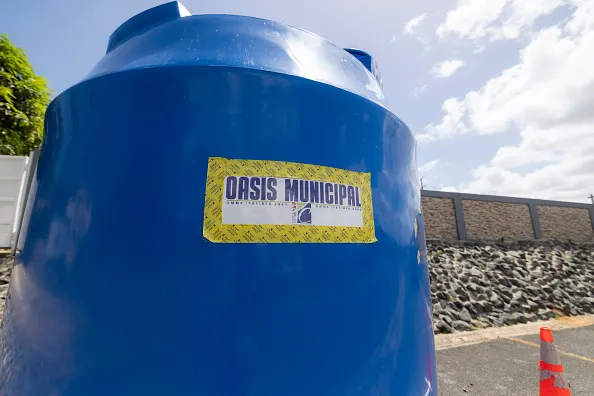 Puerto Rico Faces Water Rationing Amid Drought
A municipal water tank marked ''Oasis Municipal'' stands on a residential street in Canovanas, Puerto Rico, on July 17, 2026, as part of efforts to distribute water to residents affected by rationing
Photo by Alejandro Granadillo/NurPhoto via Getty Images